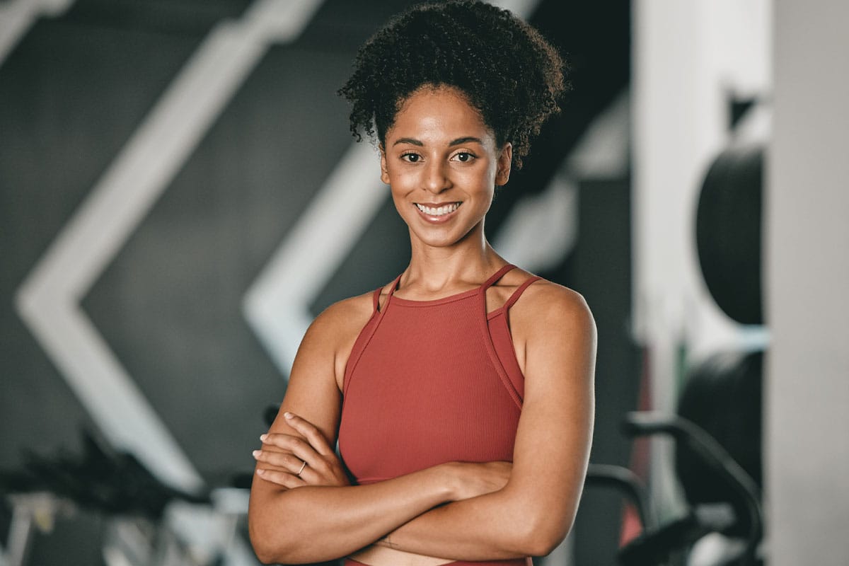 Woman smiling after medical weight loss in St. John, IN